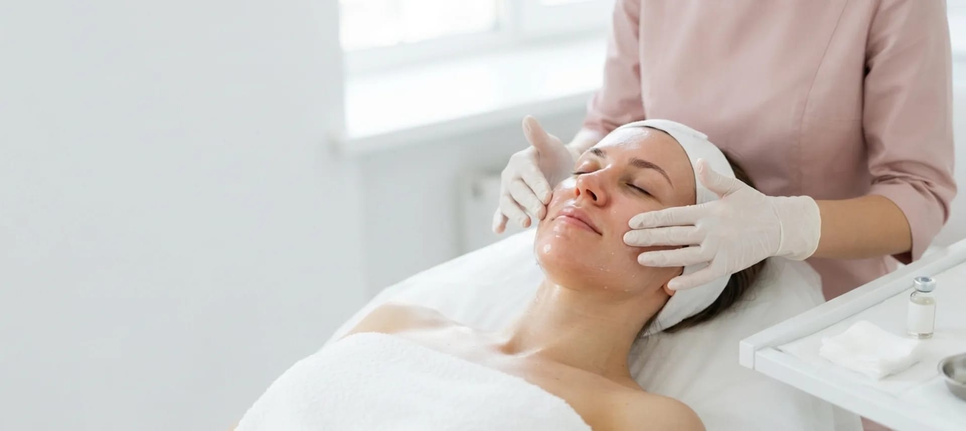 PRX-T33 needle-free skin revitalisation treatment being massaged into the skin
